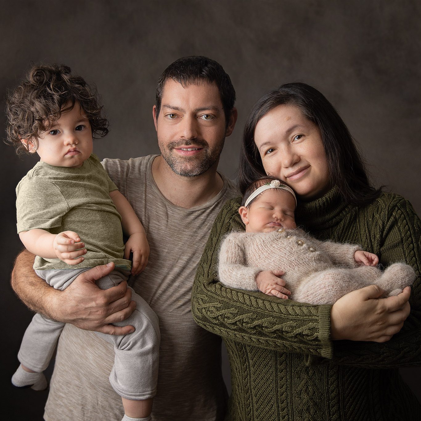 family of 4 portrait with newborn girl and toddler boy