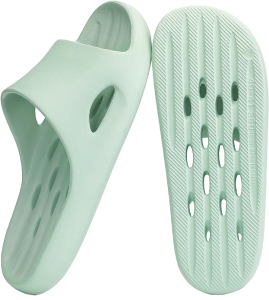 Light green shower slides with drainage holes